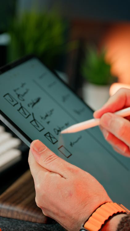 Inspector's hands marking off items on a digital compliance checklist, signalling regulated spa licensing standards
